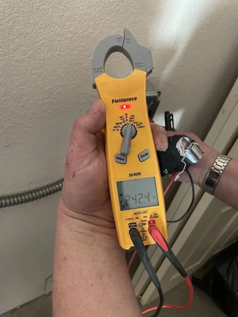 Voltage testing with clamp meter during Recessed Lighting Installation in West Pikeland